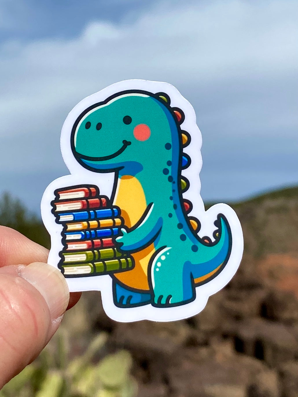 Dinosaurs carrying a stack of books Sticker, sticker, books, library, reading dinosaurs, dinos, bookworm, bibliophile, reading program,